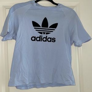 Light blue adidas shirt with suede and rib detail!